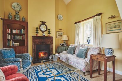 The living room with fireplace at Kipling Cottage, Cotswolds