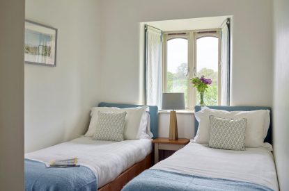 A twin bedroom at Fern House, Devon