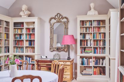 The living room with library at Carroll Cottage, Cotswolds