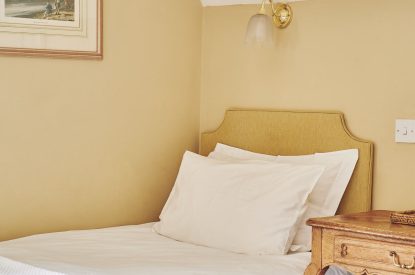 A twin bedroom at Blake Cottage, Cotswolds