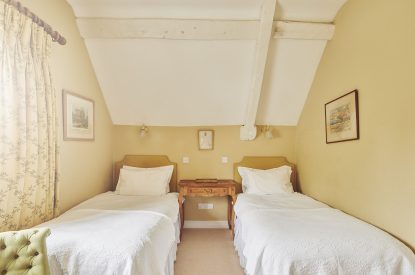 A twin bedroom at Blake Cottage, Cotswolds