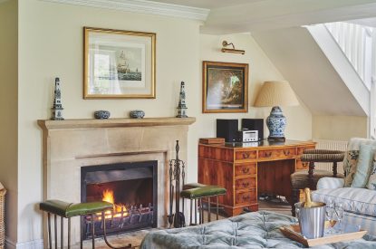 The living room with log burner at Blake Cottage, Cotswolds