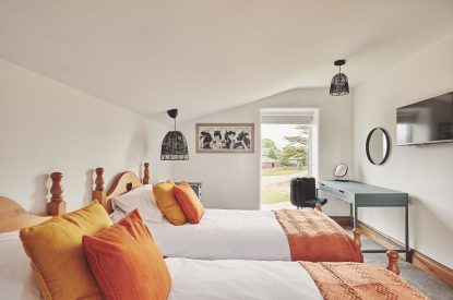 A twin bedroom at Plum Cottage, Lake District