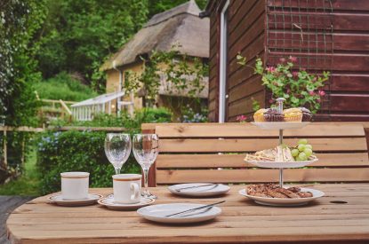 The outdoor dining table at The Round, Devon
