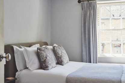 A bedroom at Crooked Cottage, Cotswolds