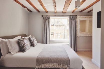 A bedroom at Crooked Cottage, Cotswolds