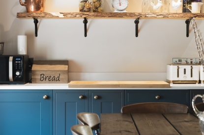 The kitchen and dining table at Holwell Farmhouse, Devon