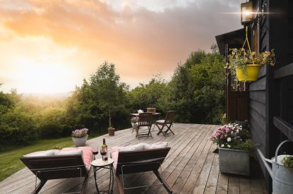 The patio and view at Hooting Owl Retreat, Somerset