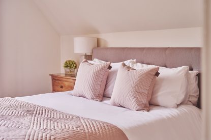 A bedroom at Apple Tree Cottage, Cotswolds
