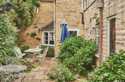 The outdoor dining table at Church View Cottage, Cotswolds