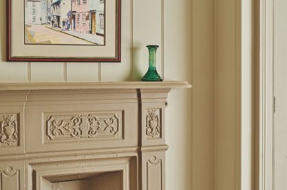 A fireplace in the bedroom at Harold House, Isle of Wight