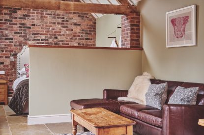 The sofa in the living room at The Dairy Barn, Worcestershire 