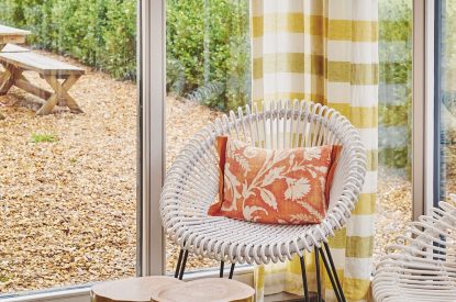 An armchair in the conservatory at Sunflower Cottage, Vale of Glamorgan