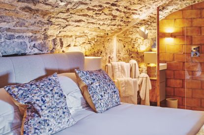 Soft furnishings on the king-size bed at Bamboo Cottage, Vale of Glamorgan