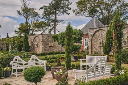 Benches in the shared garden at Camassia Cottage, Vale of Glamorgan