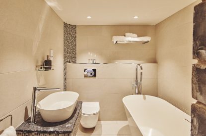 An en-suite shower room at Lotus Cottage, Vale of Glamorgan