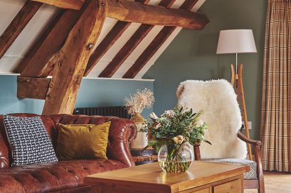 A vase of flowers in the living room at Hay Bale Cottage, Worcestershire