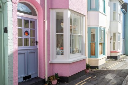 The pink exterior of Waters Dream, Devon