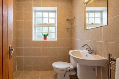 The WC with a walk in shower beside the utility room at Tinkers Folly, Yorkshire