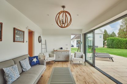 The living room with patio doors at Oakfield, Somerset