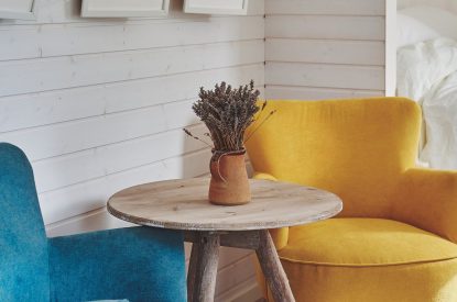 The blue and yellow armchairs at Orchard Snug, Somerset