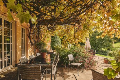 The outdoor dining area at Roupel Hall, Devon
