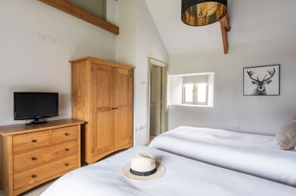 A twin bedroom at The Mill, Cornwall