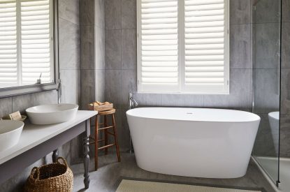 The bathroom with free standing bath at Alder Grand Suite, Cotswolds