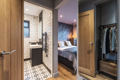 A double bedroom with ensuite at Porthleven View, Cornwall