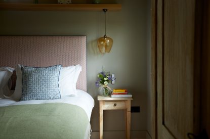 A double bed at Milk Barn, Cotswolds