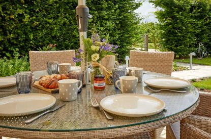 The outdoor dining table at Orchard Stable, Cotswolds