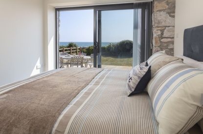 A double bedroom with sea view at Beesands Vista, Devon