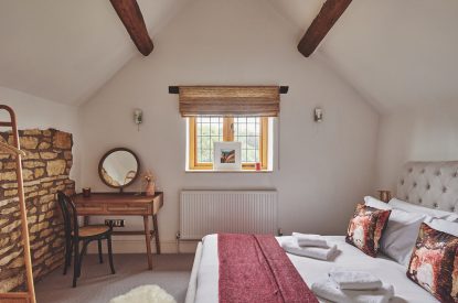 A double bedroom at Acorn Barn, Cotswolds