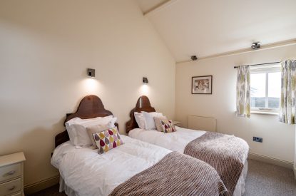 A twin bedroom at Cowdale Cottage, Yorkshire