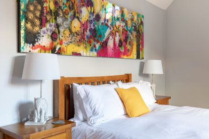 A double bed at Woodbury Cottage, Devon