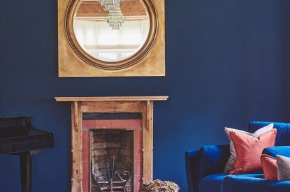 The living room with fireplace at The Old Vicarage, Lake District