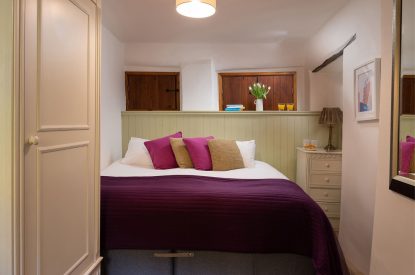 A double bedroom at Honey Buzzard Farmhouse, Devon