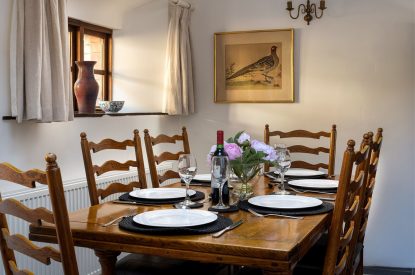 The dining table at Honey Buzzard Farmhouse, Devon
