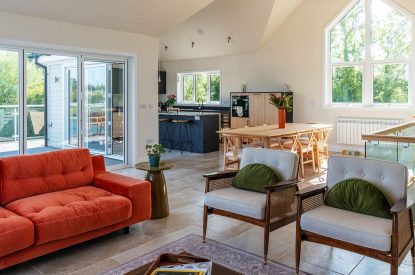 The open plan living space at Lakefront Lodge, Cotswolds