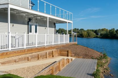 The exterior and balcony at Lakefront Lodge, Cotswolds