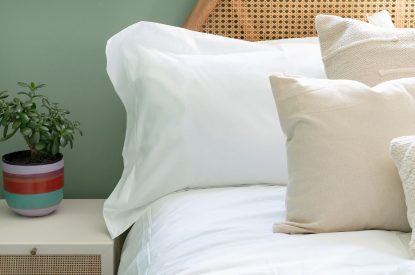 A bed at Lakefront Lodge, Cotswolds