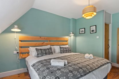 A bedroom at Teacher's Cottage, Gower