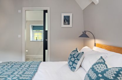 A bedroom at Teacher's Cottage, Gower