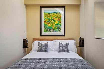 A bedroom at Teacher's Cottage, Gower