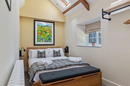 A bedroom at Teacher's Cottage, Gower