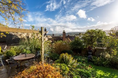 The garden overlooking the Somerset countryside at Thatch Corner, Somerset