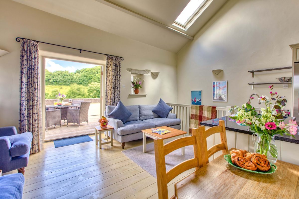 The open-plan kitchen, dining and living room at Harberton Cottage, Devon