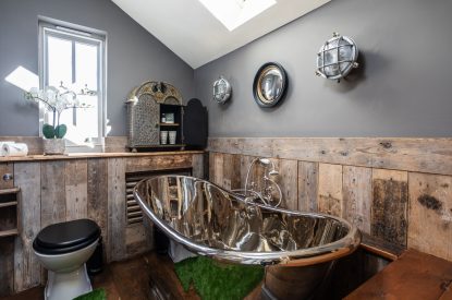 A roll top copper bath at Southside Townhouse, Cheshire