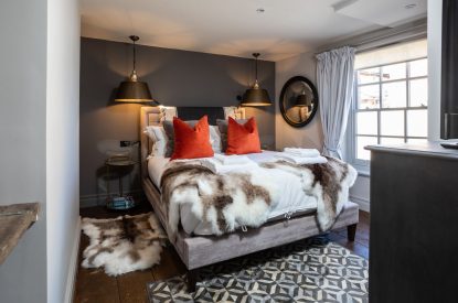 A king-size bedroom at Southside Townhouse, Cheshire