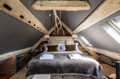 A king-size bedroom at Southside Townhouse, Cheshire